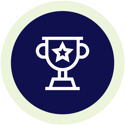 Line illustration of a trophy on a navy blue circle